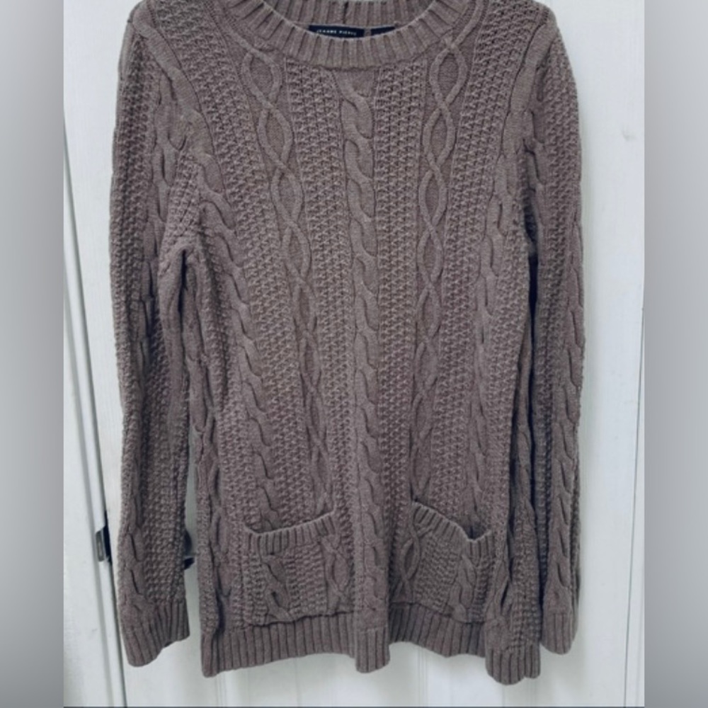 Jeanne Pierre medium cable knit sweater with two front pockets.
